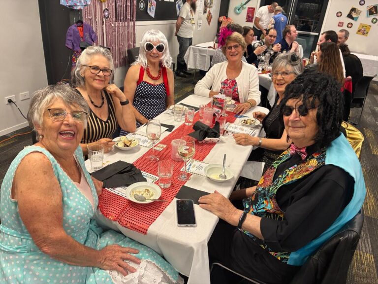 Guests in 1950s dress at the Rotary Club of Omokoroa Rock and Roll Bash.